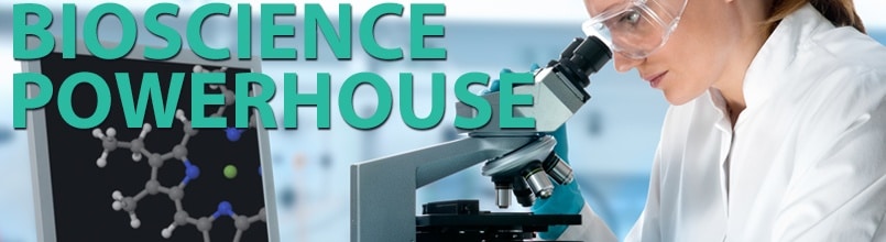 Scientist uses a microscope and the words “Biosciences Powerhouse” illustrate story about demand for Tucson commercial space.