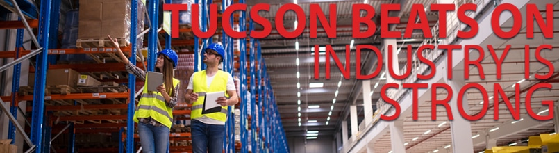 Image of a warehouse with workers and the words Tucson Beats on Industry is Strong