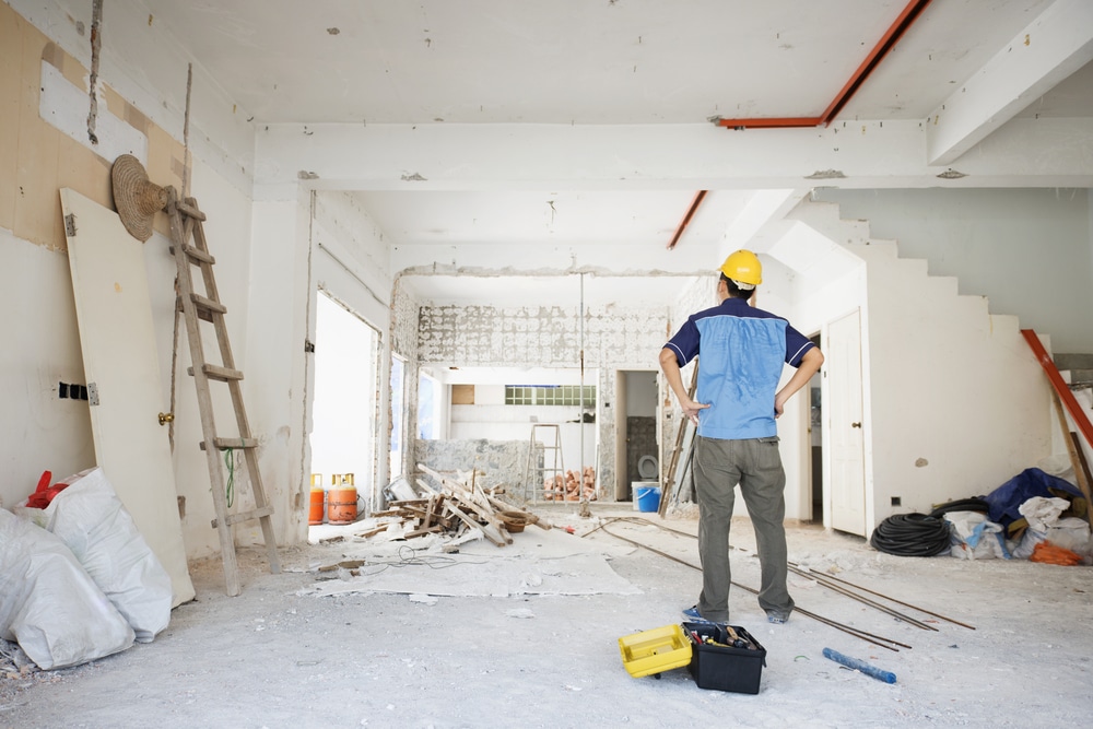 House,Improvement,Concept.,Rear,View,Of,Asian,Construction,Worker,Looking